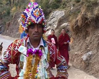 Ashok in wedding dress and nuns 